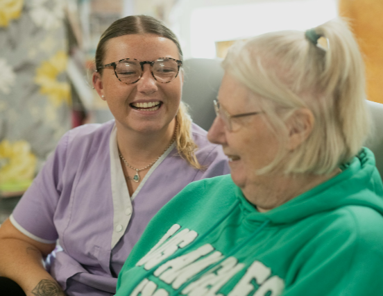 two people laughing together