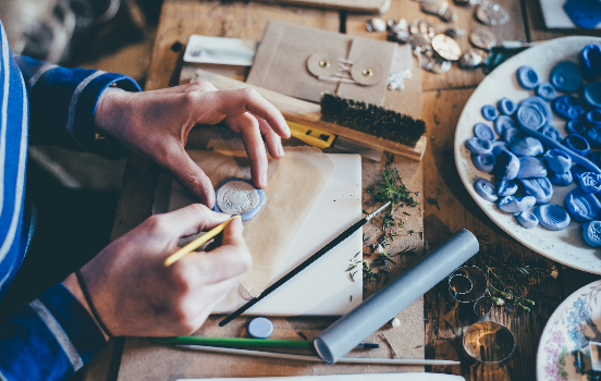 person at crafting station